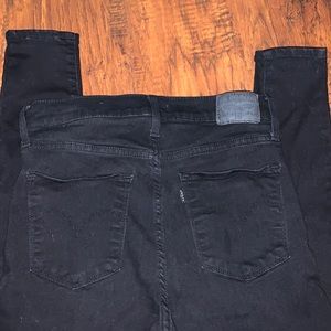 Black 720 High Rise Super Skinny